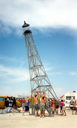 Lighthouse Being Raised, Burning Man 2002 photo