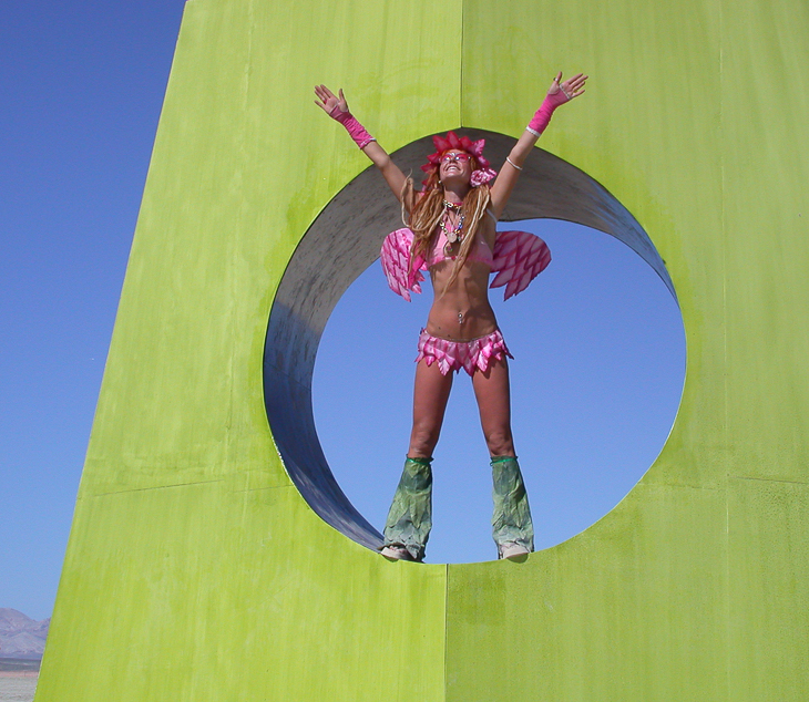 Beautiful Woman on Green Thing - 2004, Burning Man photo